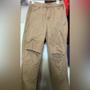 Khaki jeans with rips